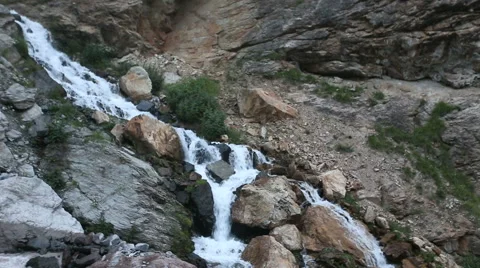 Mountain stream with waterfall Stock Footage 68693468