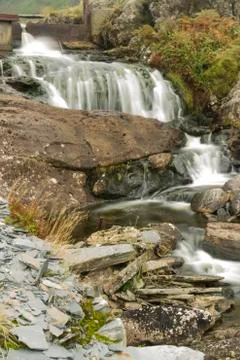 Mountain stream waterfall, long exposure Stock Photos