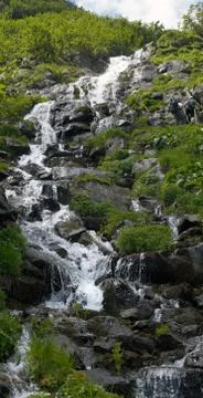 Mountain stream waterfall Stock Photos