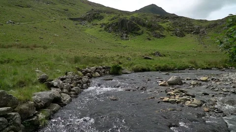 A mountain stream on Watkins Path Mount Snowdon Wales Stock Footage 122369051
