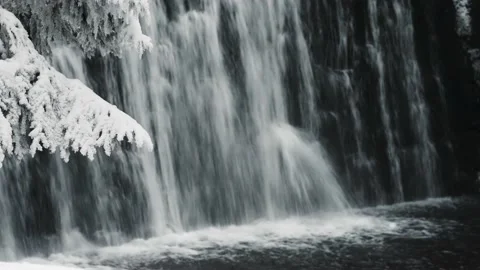 Mountain stream in the winter. Mountain Waterfall. Video stock 232344318