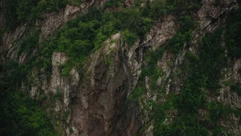 Mountain streams come together and form a mountain river, top view Vidéo 198496396