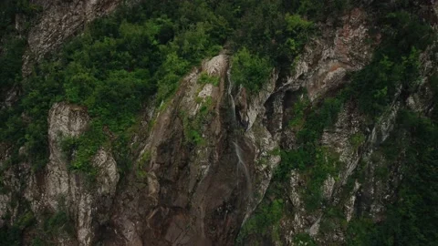 Mountain streams come together and form a mountain river, top view Vidéo 199002799