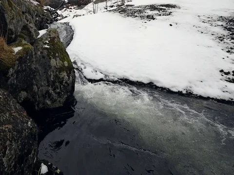 Mountain streams movement of water flowing into the ocean. Stock Footage