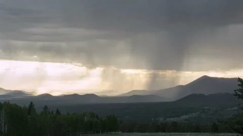 Mountain summer rain at sunset Vídeos de archivo 51239084