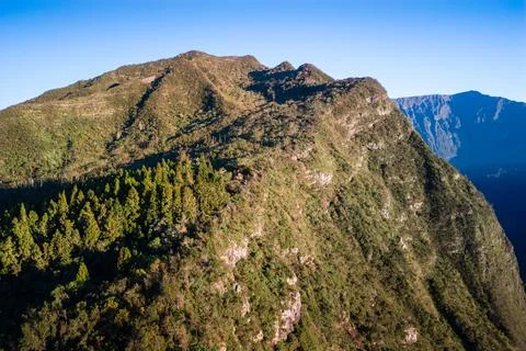 Mountain summit at Les Makes viewpoint at sunrise at Reunion Island Stock Photos