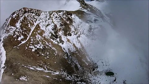 Mountain summit with snow and clouds 1080p HD Video stock 92803964