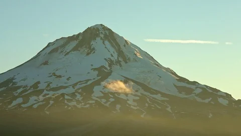 Mountain summit sunset light rays Mt. Hood Oregon Cascades Stock Footage 81792697