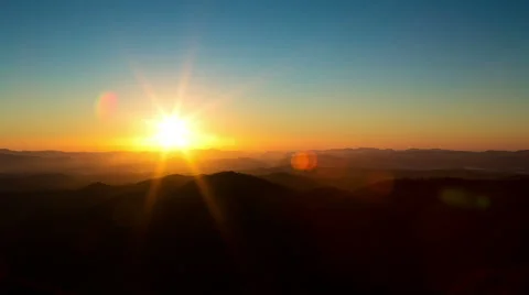 Mountain Sun Rise Time Lapse With Lens Flare Wide Stock Footage