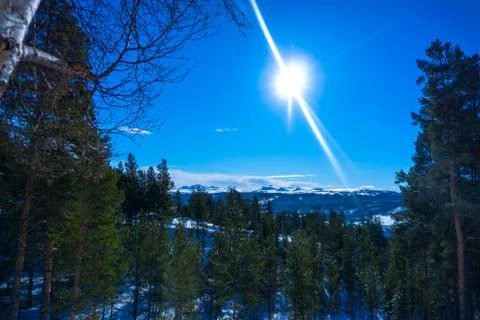 Mountain sun in winter time Stock Photos