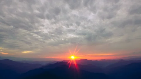 The mountain sunrise on the cloud stream background. time lapse Stock Footage 95885761