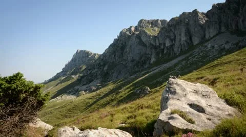 Mountain sunrise timelapse long shadows Stock Footage 11874347