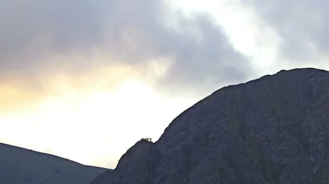 Mountain sunset dawn time lapse with yellow sky ans clouds Stock Footage 44519204