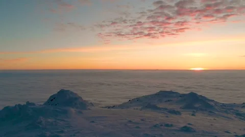 Mountain sunset during winter Stockbeeldmateriaal 148175372