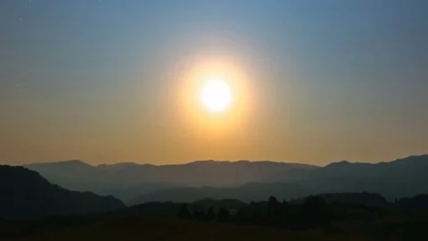 The mountain sunset on the starry sky background. time lapse Stock Footage 80426585