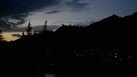 Mountain sunset timelapse overlooking town 4K Stock Footage