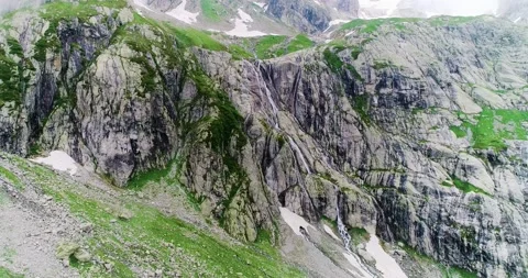 Mountain surrounded by clouds in aerial view. We can see in the horizon the moun Stock Footage 137002515