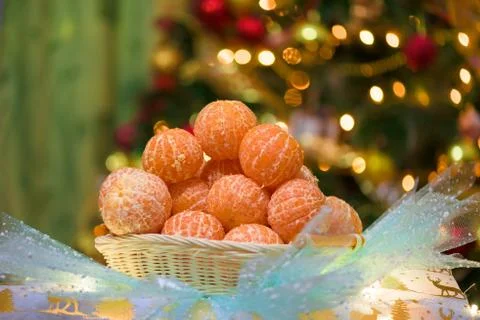 Mountain tangerines on the background of the Christmas tree. Christmas photo, Stock Photos
