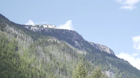 Mountain time lapse with clouds going by Stock Footage 105769566