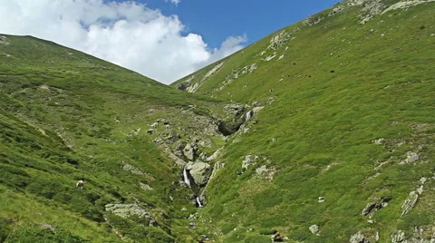 Mountain Time lapse with clouds moving rolling over green hills and valleys Video stock 51564816