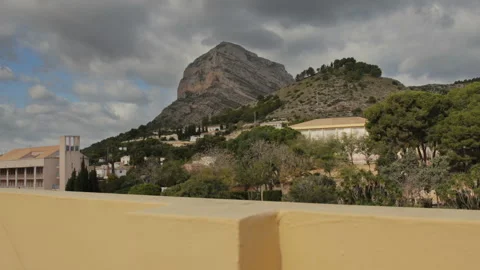 Mountain Time-Lapse on cloudy day with dolly motion - Slow camera motion Stock Footage 143894222