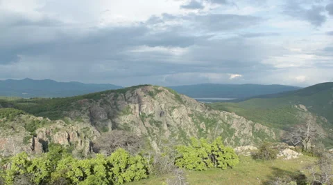 Mountain time lapse over the hills with moving clouds Vídeo Stock 39839507