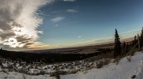 Mountain Timelapse of Clouds Moving Acrros the Sky Winter Video stock 60950532
