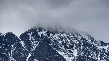 Mountain timelapse over snow Covered New Zealand mountains Stock Footage