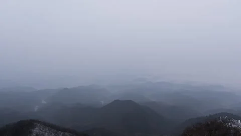 Mountain Top Cloud Mist Time-lapse with Rolling Fog and Peak Landscape Stock Footage 326671696