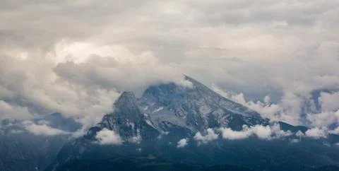 Mountain top with clouds Stock Photos