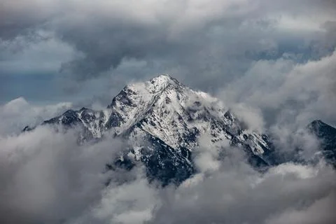 Mountain top in clouds Stock Photos