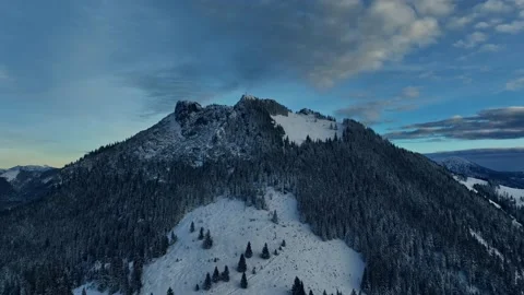 Mountain top in snow. Landscape. Sunset. A person on the mountain top. Stock Footage 227113211
