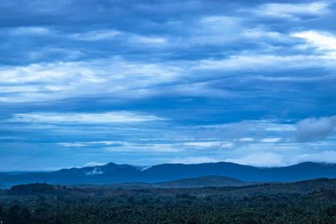 Mountain top view of clouded sky with hill range 스톡 사진
