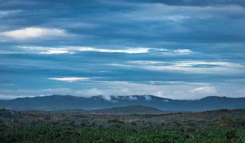 Mountain top view of hill range with clouded sky 스톡 사진