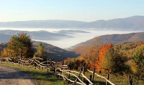 Mountain tops above the clouds Stock Photos