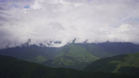 Mountain tops in the clouds of time laps. Nature, forest in summer. Cloudy Video stock 170757446
