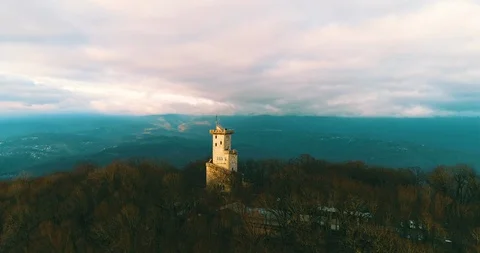 Mountain with a tower covered with forest. Mount Akhun, Sochi, Russia Stock Footage 86522743