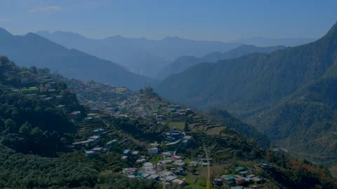 A mountain town wrapped in layers of hills Stock Footage 324777554