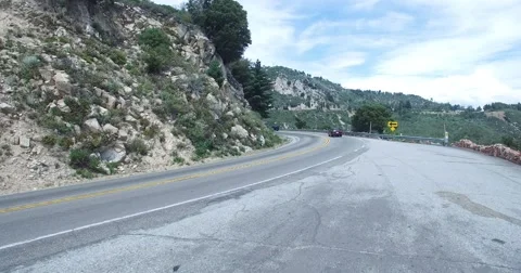 Mountain traffic UPS delivery drone Stock Footage 54762484