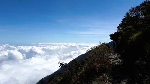 Mountain Trail Above the Clouds Stock Photos