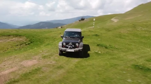 Mountain Trail Explorer: SUV Adventure in Rugged Terrains Stock Footage 254432543
