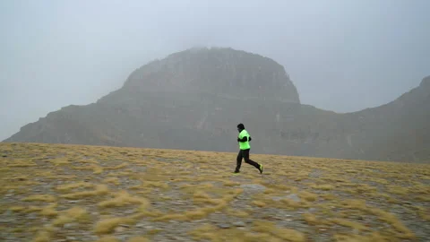 Mountain Trail Runner on Plateau of Muses with Throne of Zeus Stock Footage 331172890