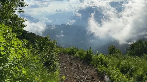 Mountain Trail in Sochi Above Cloud Filled Green Valley Stockbeeldmateriaal 300199377