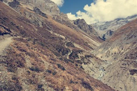 Mountain trail on a steep slope. Stock Photos