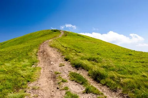 Mountain trail to the top of the summit Stock Photos