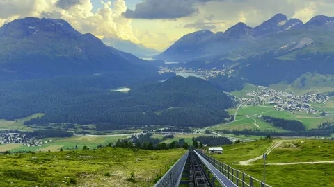 Mountain Train with Beautiful Panoramic View over Alpine Lakes and Mountainscape Stockbeeldmateriaal 293673377