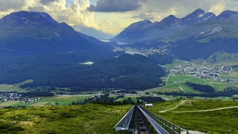 Mountain Train with Panoramic View over Beautiful Mountainscape and Cityscape Stock Footage 286101281