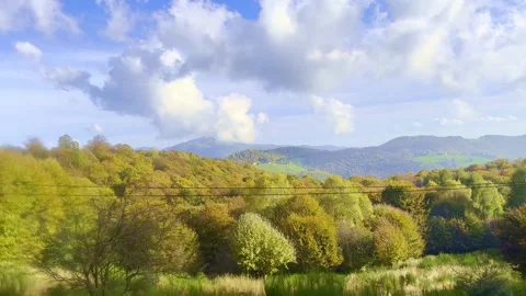 Mountain Train with Window View on the Autumn Forest and Mountainscape 動画素材 265058445