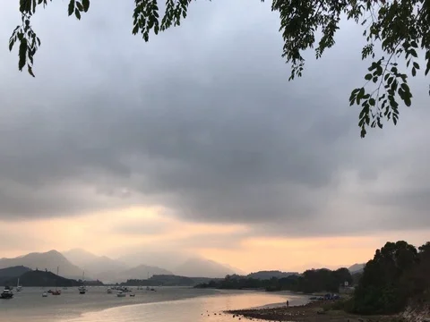 Mountain, tree, lake, cloud and sky at sunset Video stock 75831884