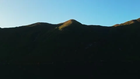 A mountain in the trees. A mountain. The top of a mountain. Rocks. Top of the Stock Footage 261059921